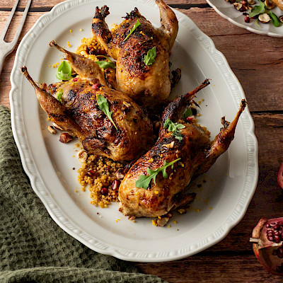 Kwartel gevuld met couscous, sinaasappel & hazelnoot